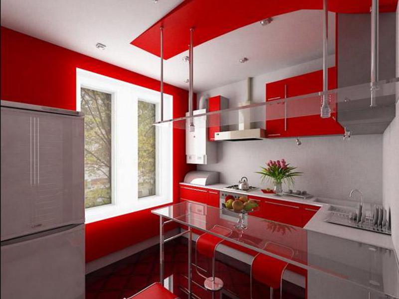 Угловая кухня красного цвета с окном